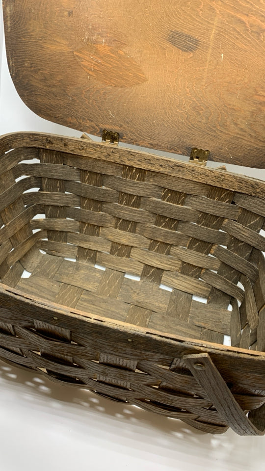VTG BROWN WOVEN BASKET W/FLIP LID AND HANDLES.