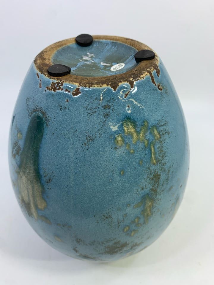 LIGHT BLUE POTTERY VASE.