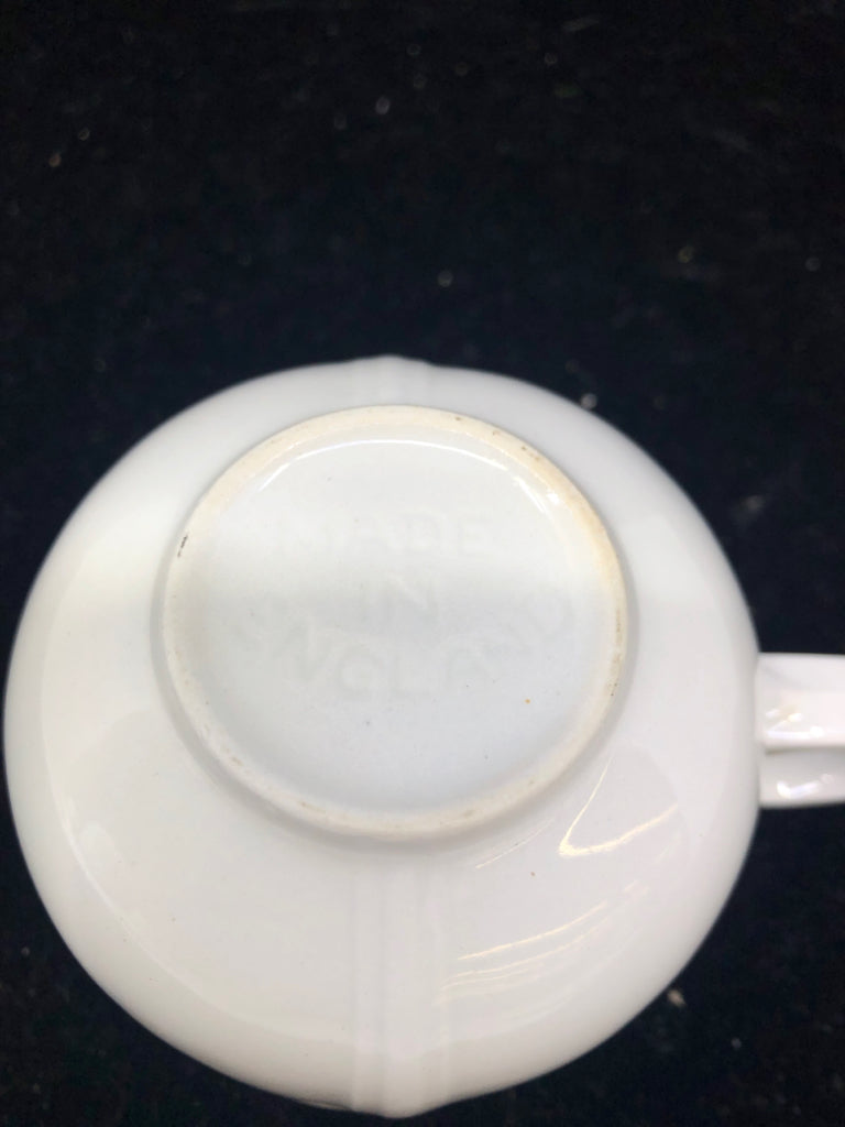 9 PC TEA POT + 4 CUP/SAUCERS -FOCUS PATTERN.