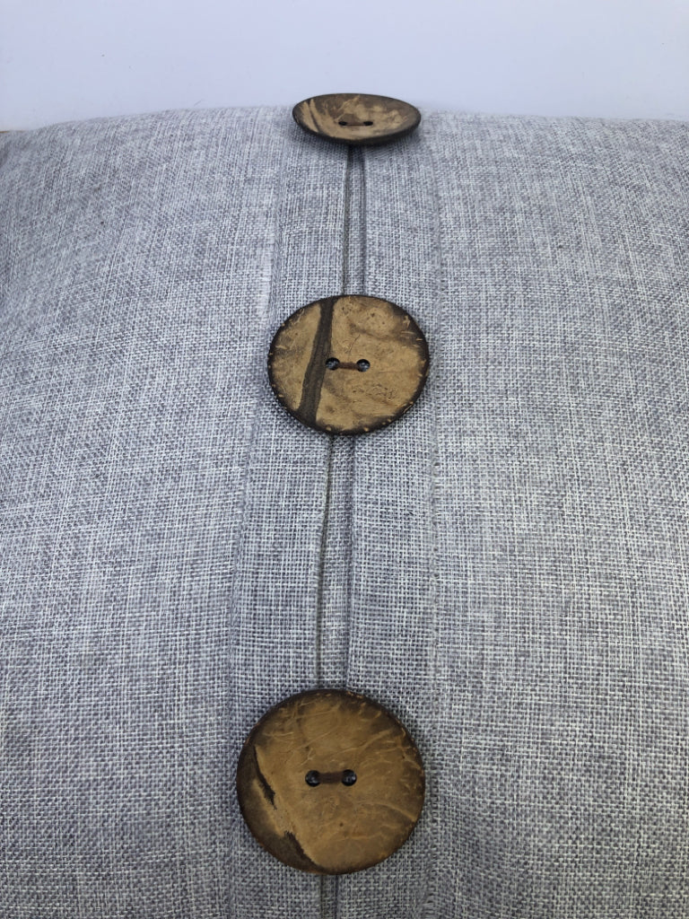LIGHT GREY SQUARE PILLOW W/ LARGE BUTTONS/ROPE TRIM.