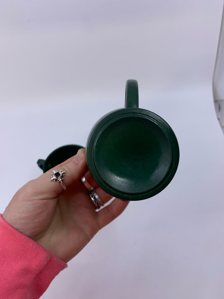 FOOTED DARK GREEN PAINTED GLASS CREAM/SUGAR SET.