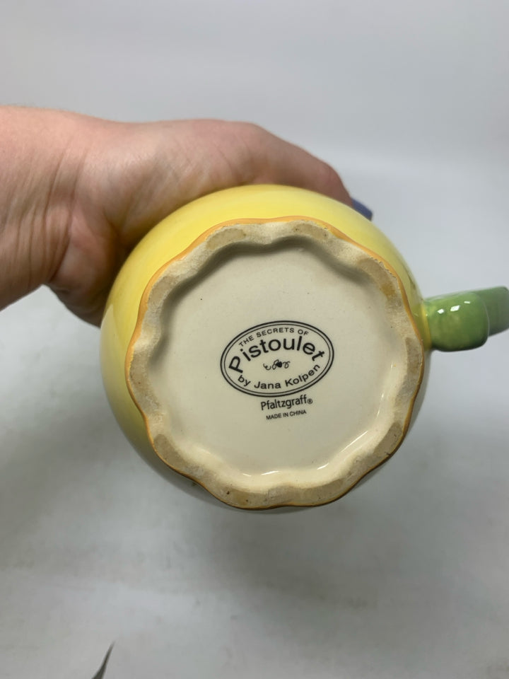 FOOTED CREAMER W/ VINE DETAILS.