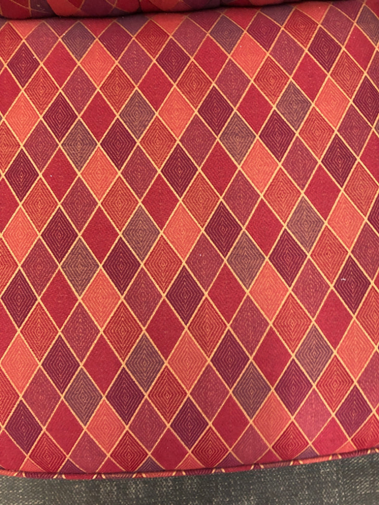 MULTI COLORED PRISM PATTERN FABRIC ACCENT CHAIR.