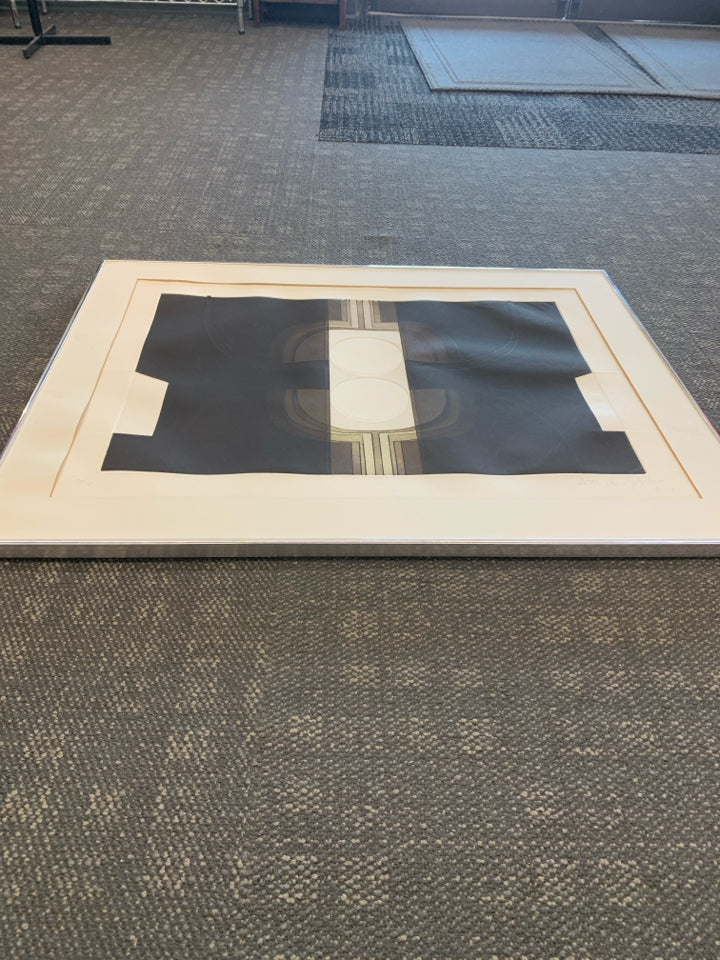 ABSTRACT CIRCLE WALL ART l- SIGNED IN SILVER FRAME.