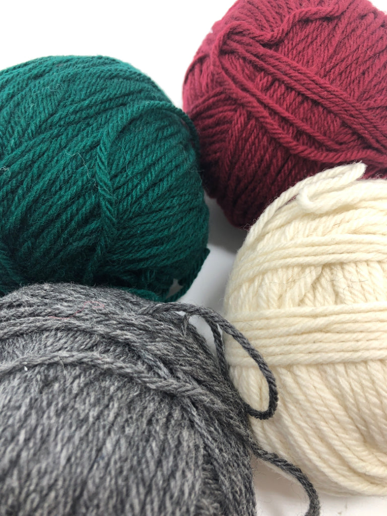 4 RED/GREEN/GREY/WHITE YARN IN BAG.