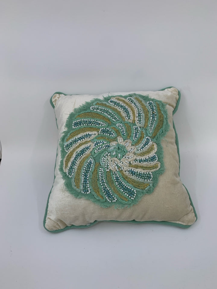 SMALL BEADED SHELL PILLOW.