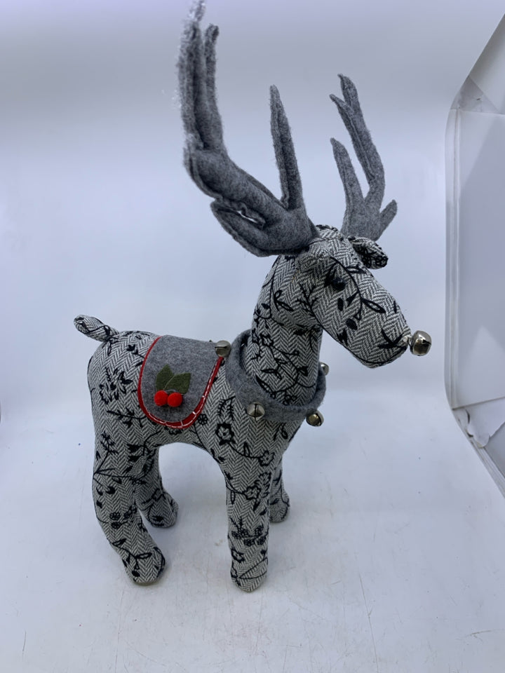 GREY W/ EMBROIDERED BLACK FLOWERS STANDING REINDEER PLUSH.