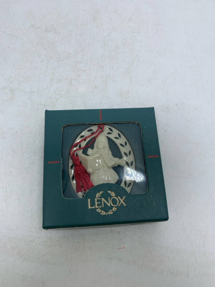 VTG IN BOX CAROLER LENOX ORNAMENT.