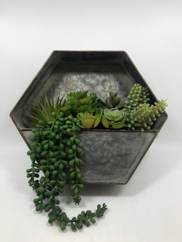FAUX SUCCULENTS IN STANDING GALVANIZED PLANTER.
