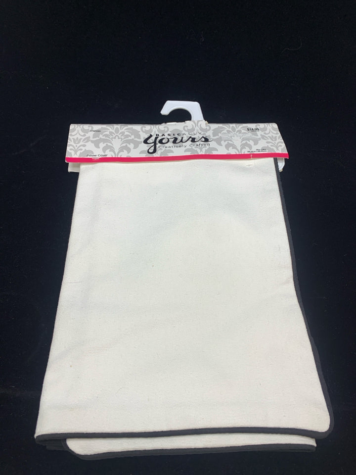CREAM W/BLACK TRIM PILLOW COVER.