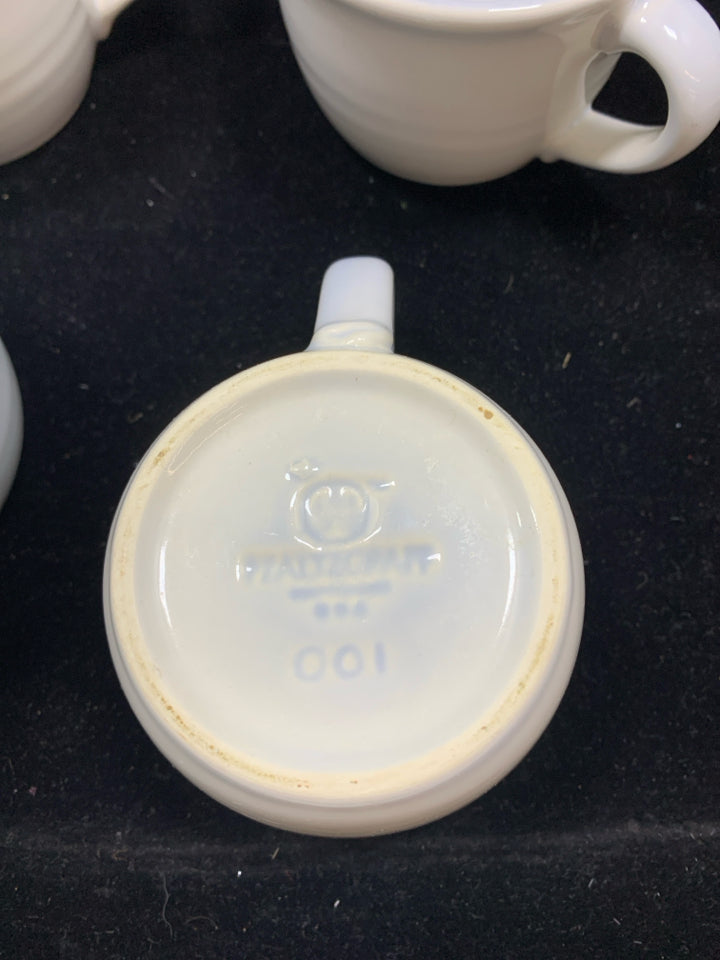 4 SHORT LIGHT BLUE W/ DARK BLUE STRIPE PFALTZGRAFF MUGS.