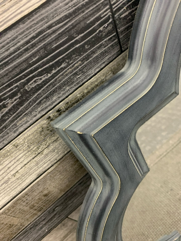 MIRROR W/BLACK DISTRESSED FRAME.