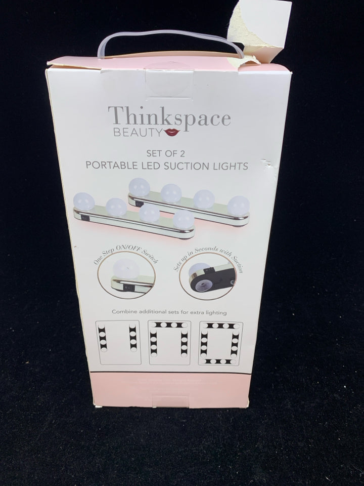 NIB PORTABLE SUCTION LIGHTS.
