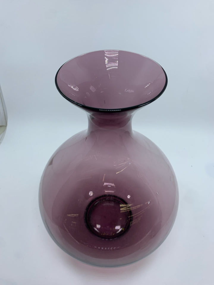 CURVED PURPLE GLASS VASE.
