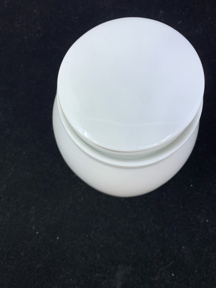 WHITE CANISTER.