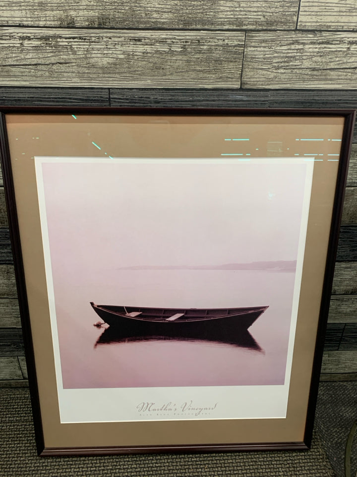 MARTHA'S VINEYARD CANOE PRINT IN BROWN WOOD FRAME.