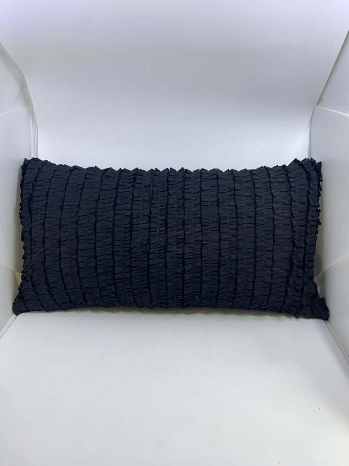 BLACK RUFFLED RECTANGLE PILLOW.
