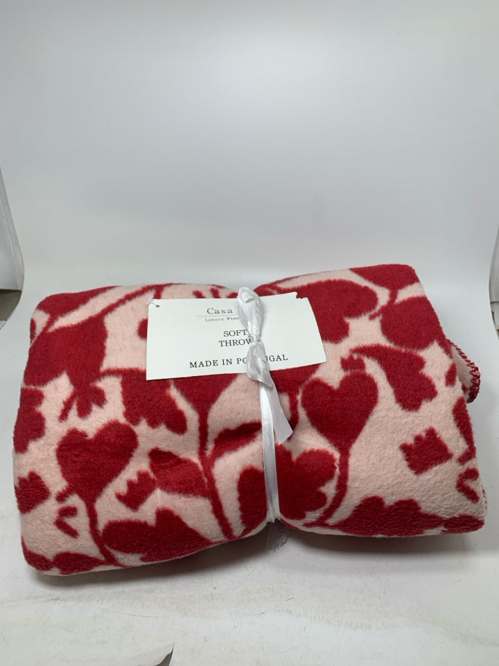 NWT RED/PINK PATTERN THROW BLANKET.