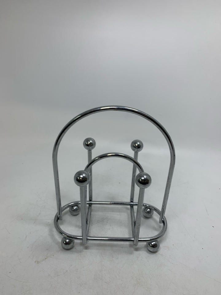 DOUBLE METAL HEAVY NAPKIN HOLDER.