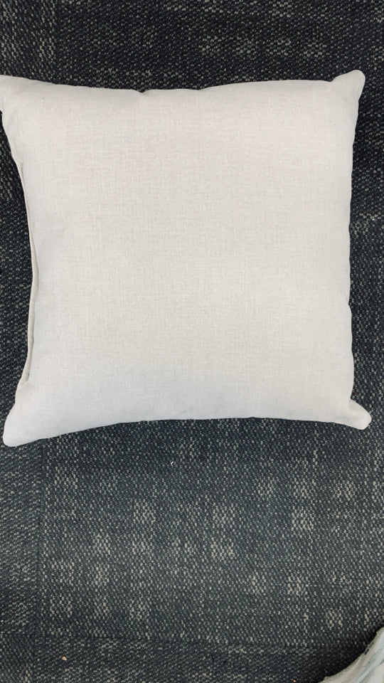 WHITE ACCENT PILLOW TEAL/BROWN/BLACK TRIANGLE DESIGN.