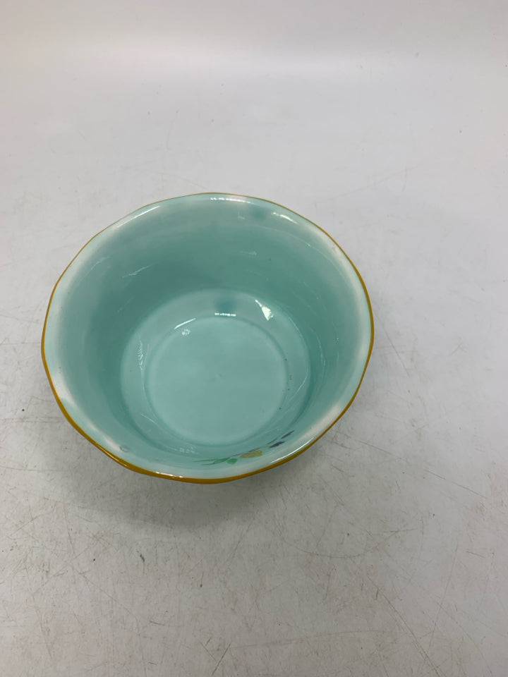 LIGHT BLUE IRONSTONE SMALL BOWL W/ RED DETAILED EDGE.