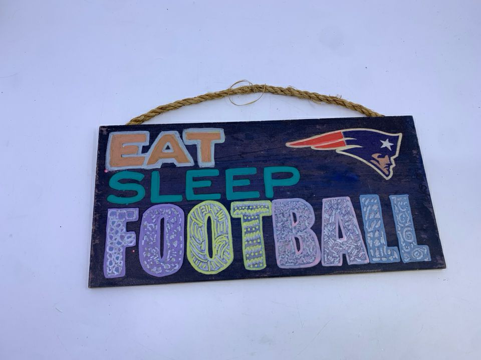 EAT SLEEP FOOTBALL SIGN.