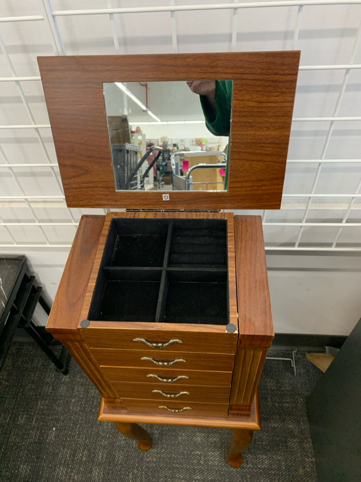 FAUX BROWN WOOD JEWELRY ARMOIRE.