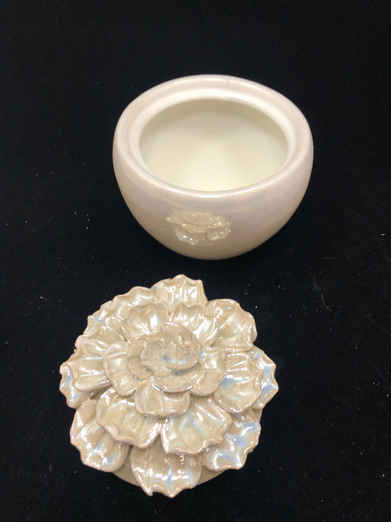 IRIDESCENT CERAMIC JAR W/FLOWER LID.