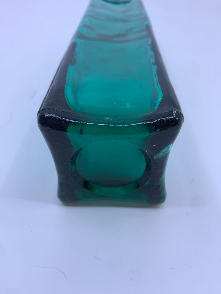 EMPTY TEAL GLASS DECORATIVE BOTTLE.