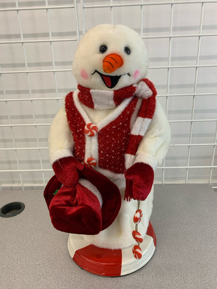 TWIRLING MUSICAL SNOWMAN.