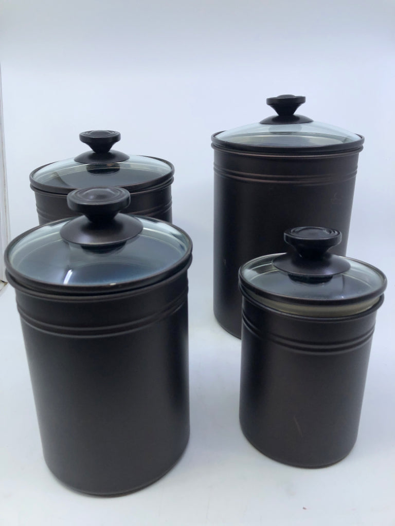 4 BROWN METAL CANISTERS.