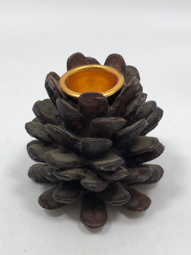 PINECONE TAPER CANDLE HOLDER.