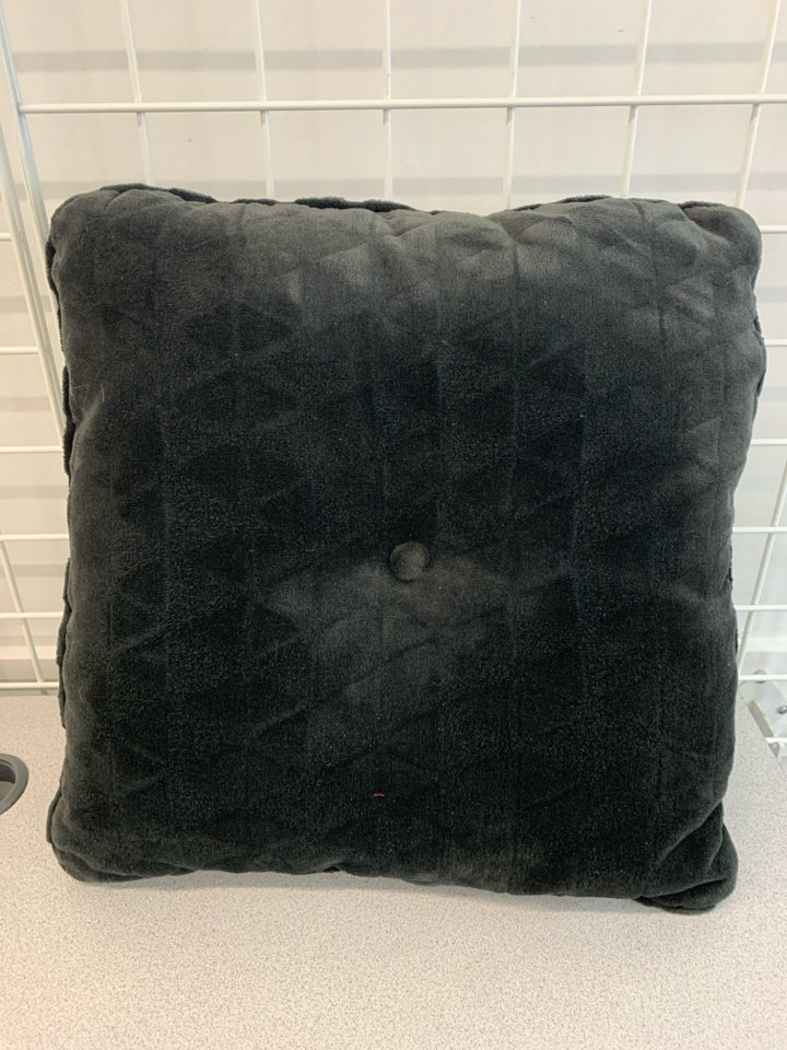 BLACK FUZZY PILLOW.