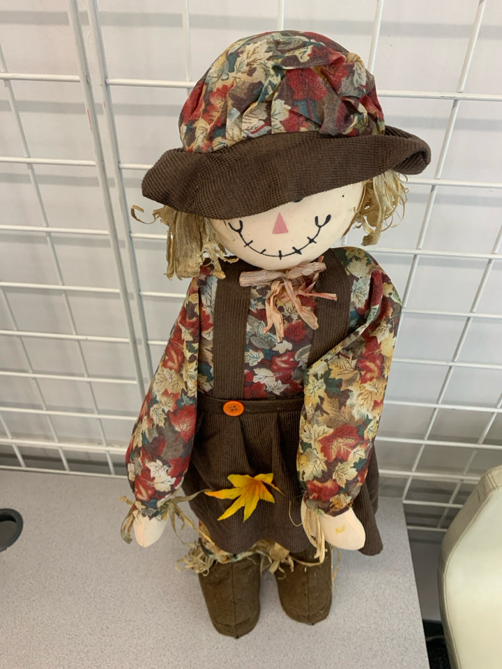 AUTUMN SCARECROW IN BROWN OVERALL DECOR.