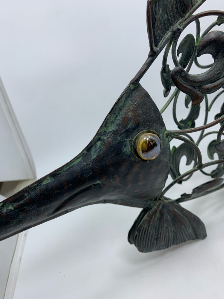 METAL SWORDFISH CANDLE HOLDER.