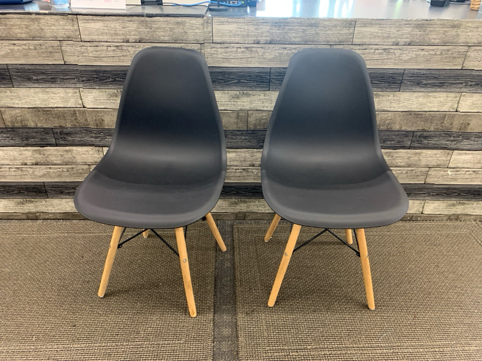 2 DARK GREY PLASTIC CHAIRS W/ WOOD LEGS.