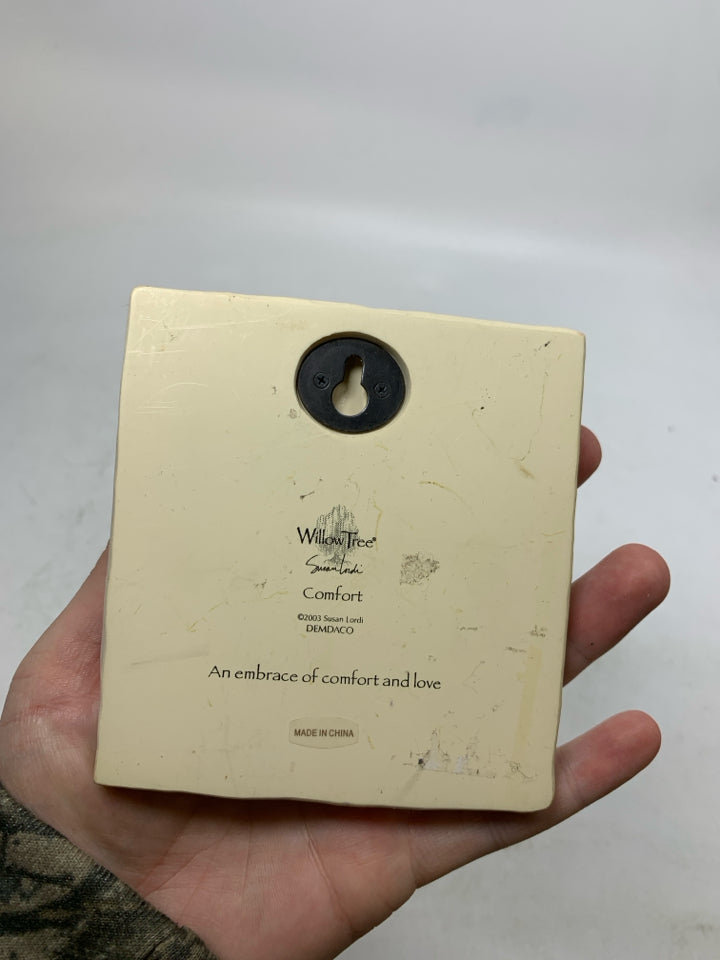 GIRL HOLDING CATE "COMFORT" PLAQUE.