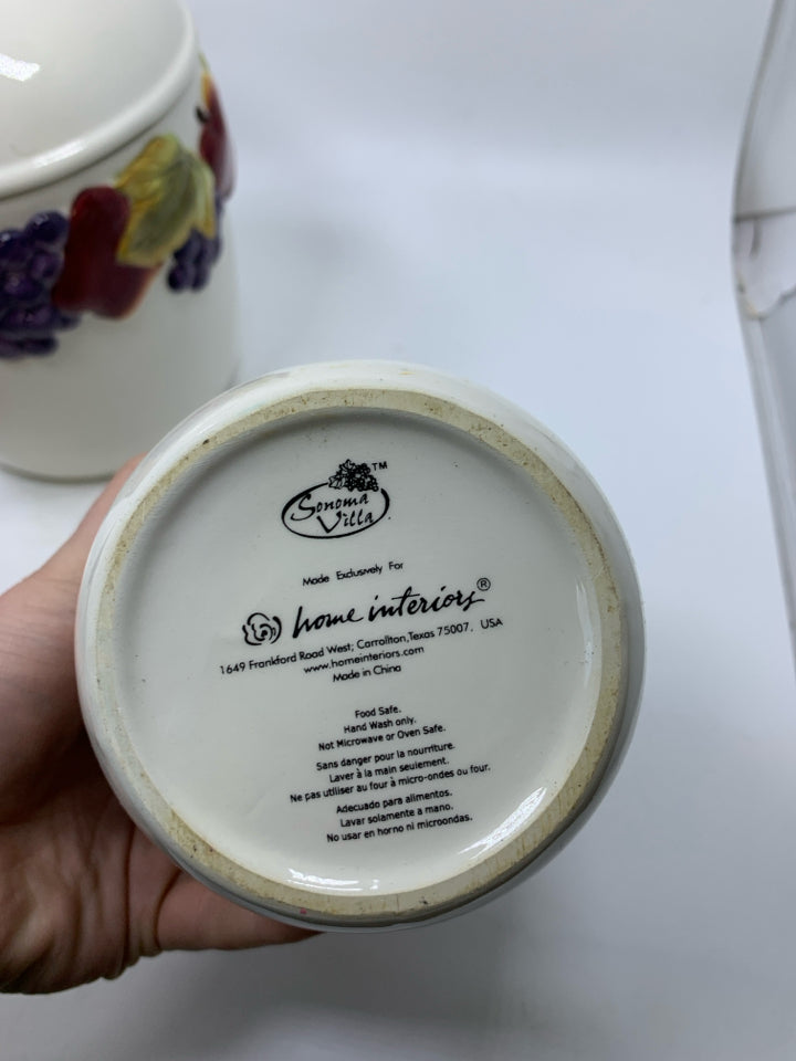 3 CERAMIC EMBOSSED FRUIT CANISTERS.