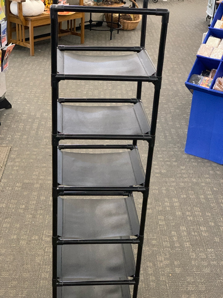 10 TIER VERTICAL PLASTIC/FABRIC SHOE RACK.