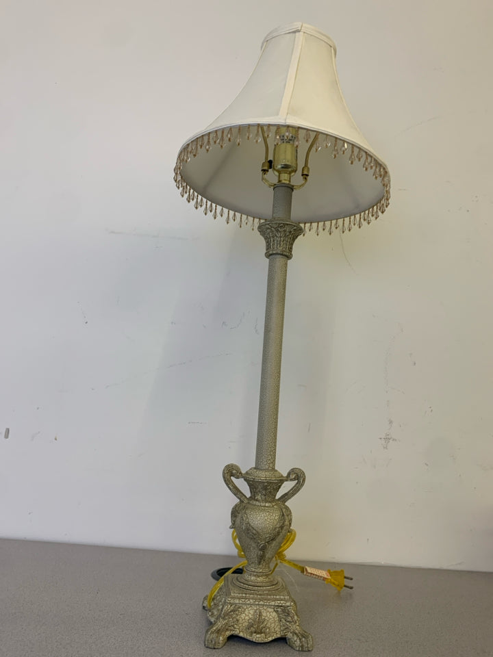 TALL CREAM CRACKLE BASE LAMP WITH WHITE AND BEADED SHADE.