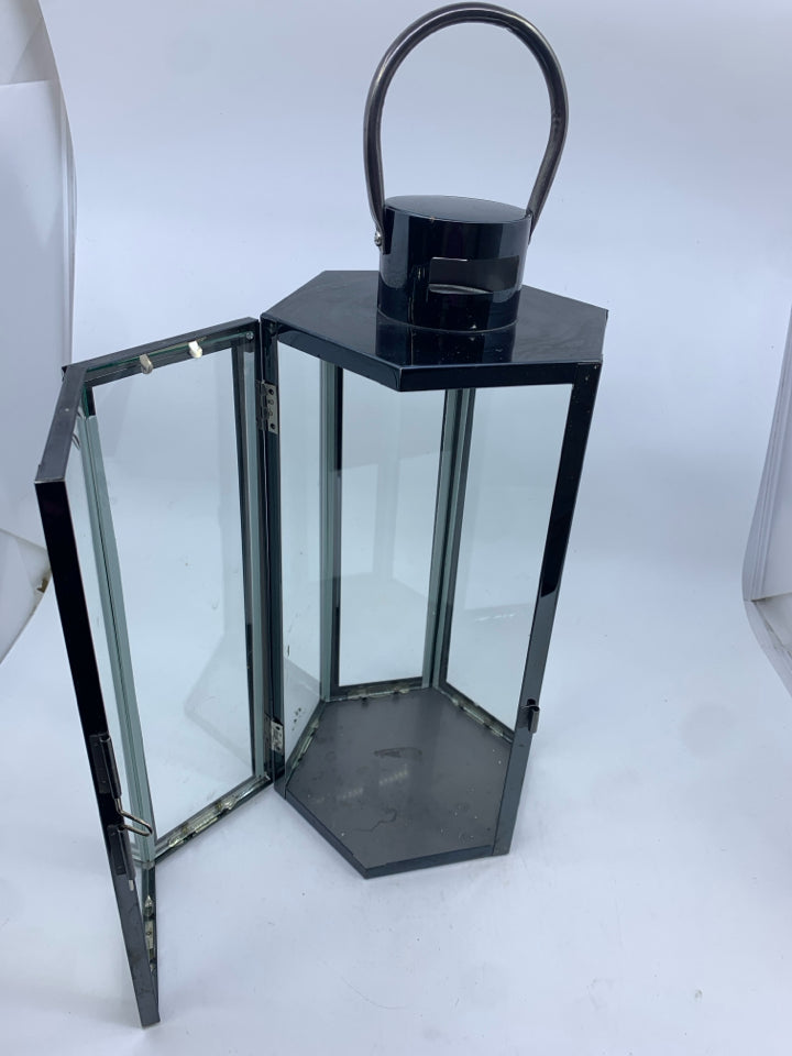 METALLIC LANTERN W GLASS DOORS.