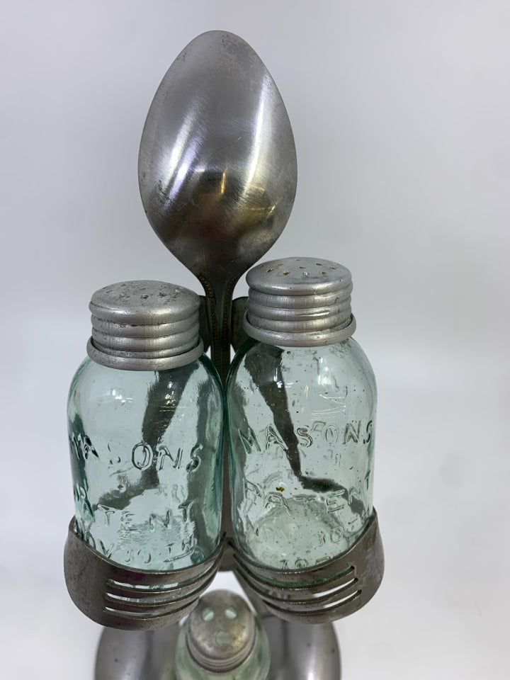 METAL SPOON FIGURE HOLDING SALT/PEPPER AND TOOTHPICK HOLDER.