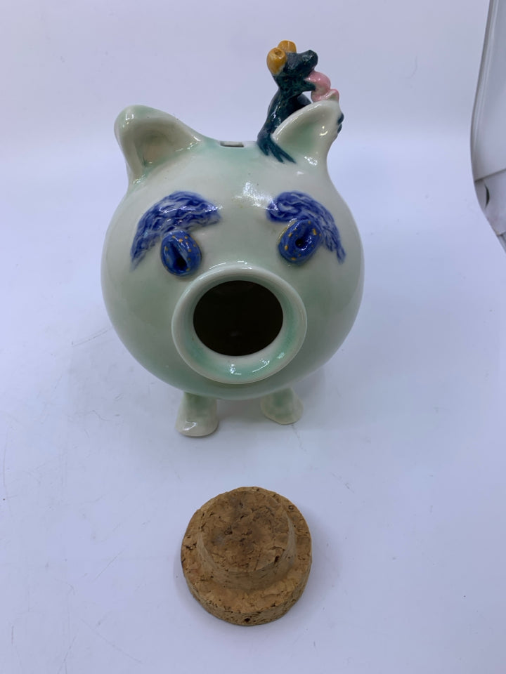 MINT GREEN POTTERY PIGGY BANK W/ CORK NOSE/ FROG LICKING EAR.