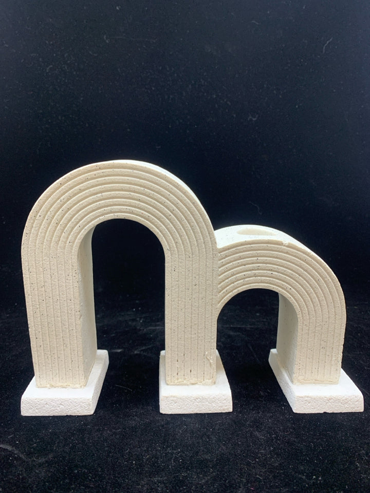 DOUBLE ARCHED CANDLE HOLDER.