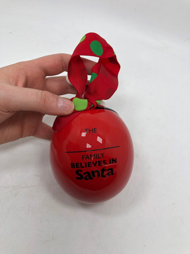 FAMILY BELIEVES IN SANTA RED SANTA ORNAMENT.