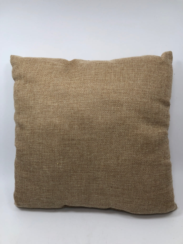FUZZY PUMPKIN ON BURLAP THROW PILLOW.