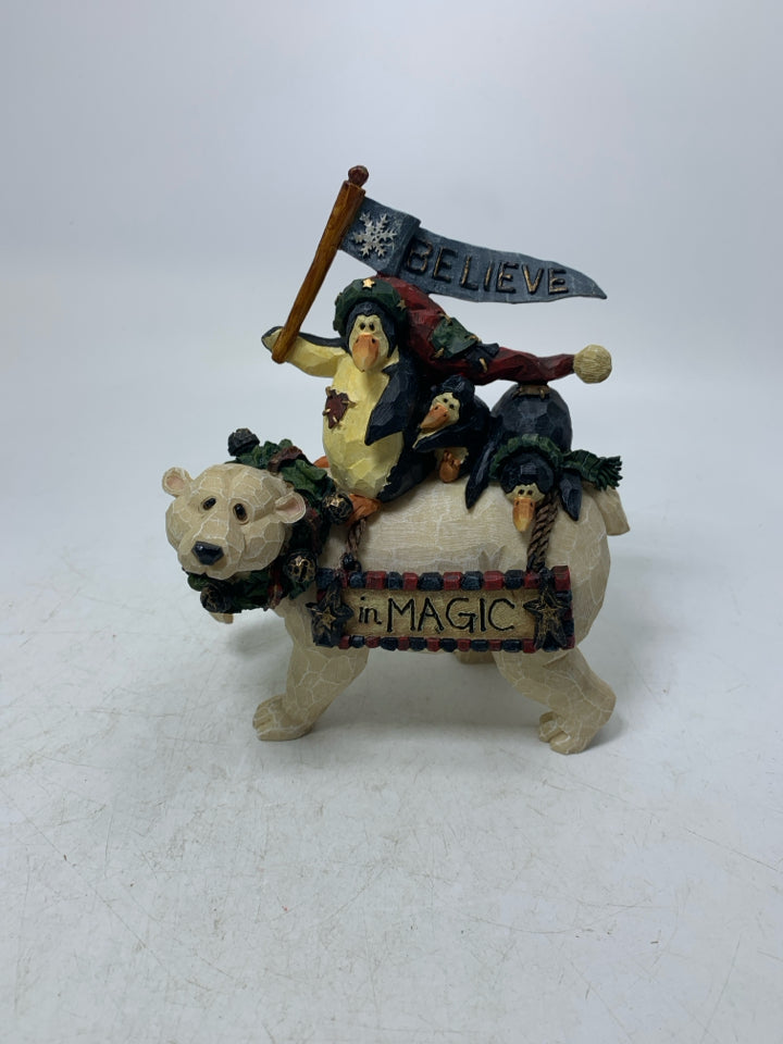 RESIN PENGUINS RIDING A POLAR BEAR CARVERS CHOICE.