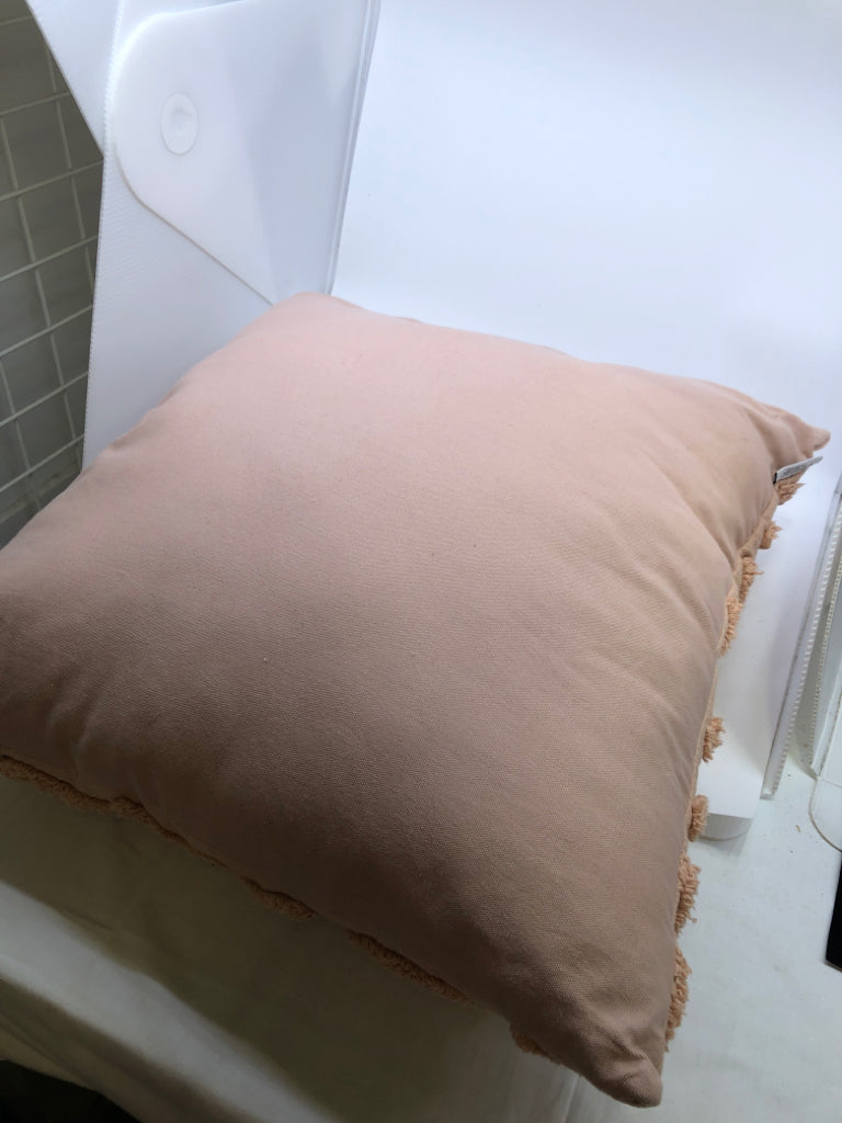 LARGE PINK TEXTURED PILLOW.