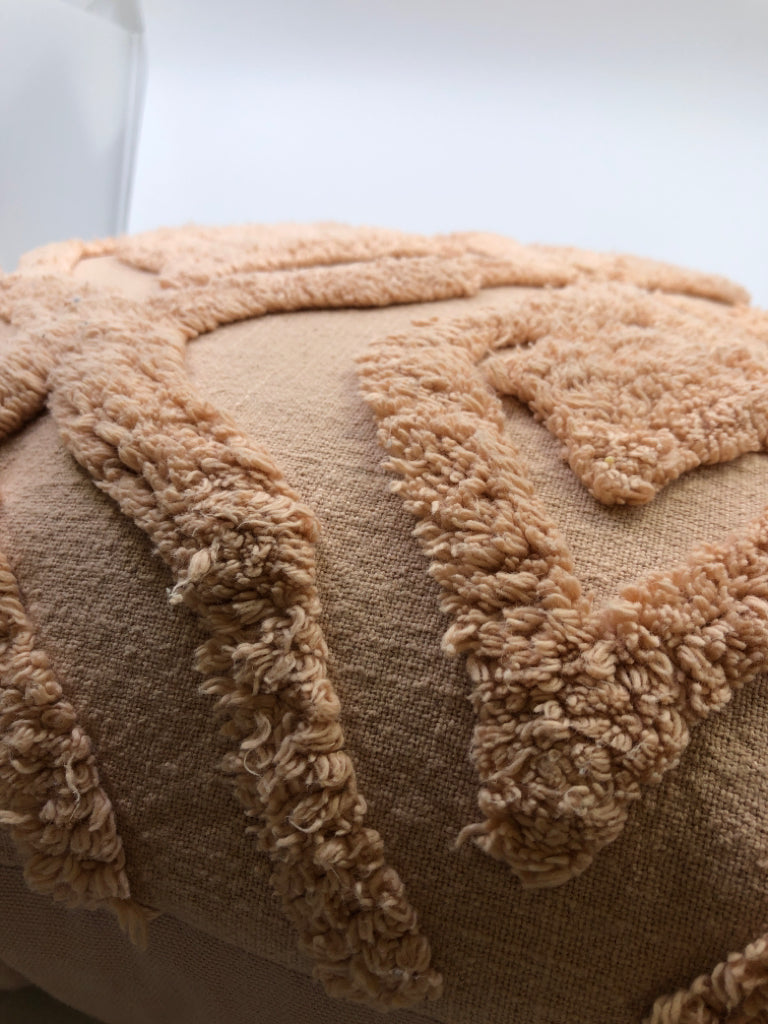 LARGE PINK TEXTURED PILLOW.