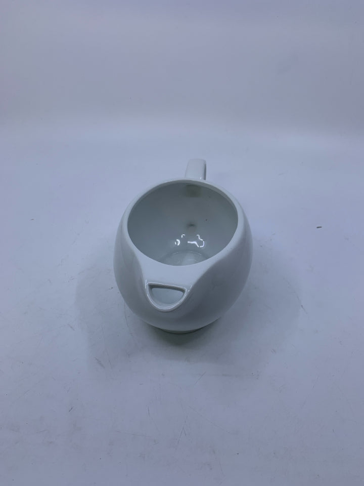 WHITE GRAVY BOAT OUR TABLE.